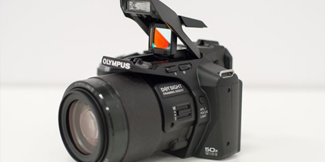 Imagem de A Olympus SP-100 é uma câmera com superzoom e mira red dot no site TecMundo